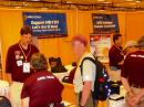 ARRL Media and Public Relations Manager Sean Kutzko, KX9X (left, standing), and other members of the ARRL EXPO team meet with members at Dayton Hamvention. [Steve Ford, WB8IMY, photo] 